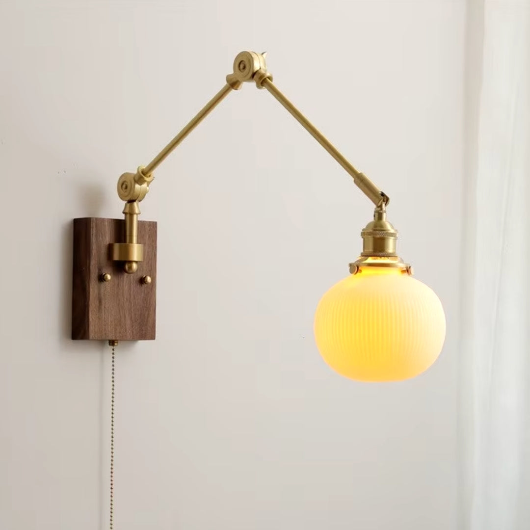 adjustable gold swing arm wall light, ideal for living room task lighting or reading nook