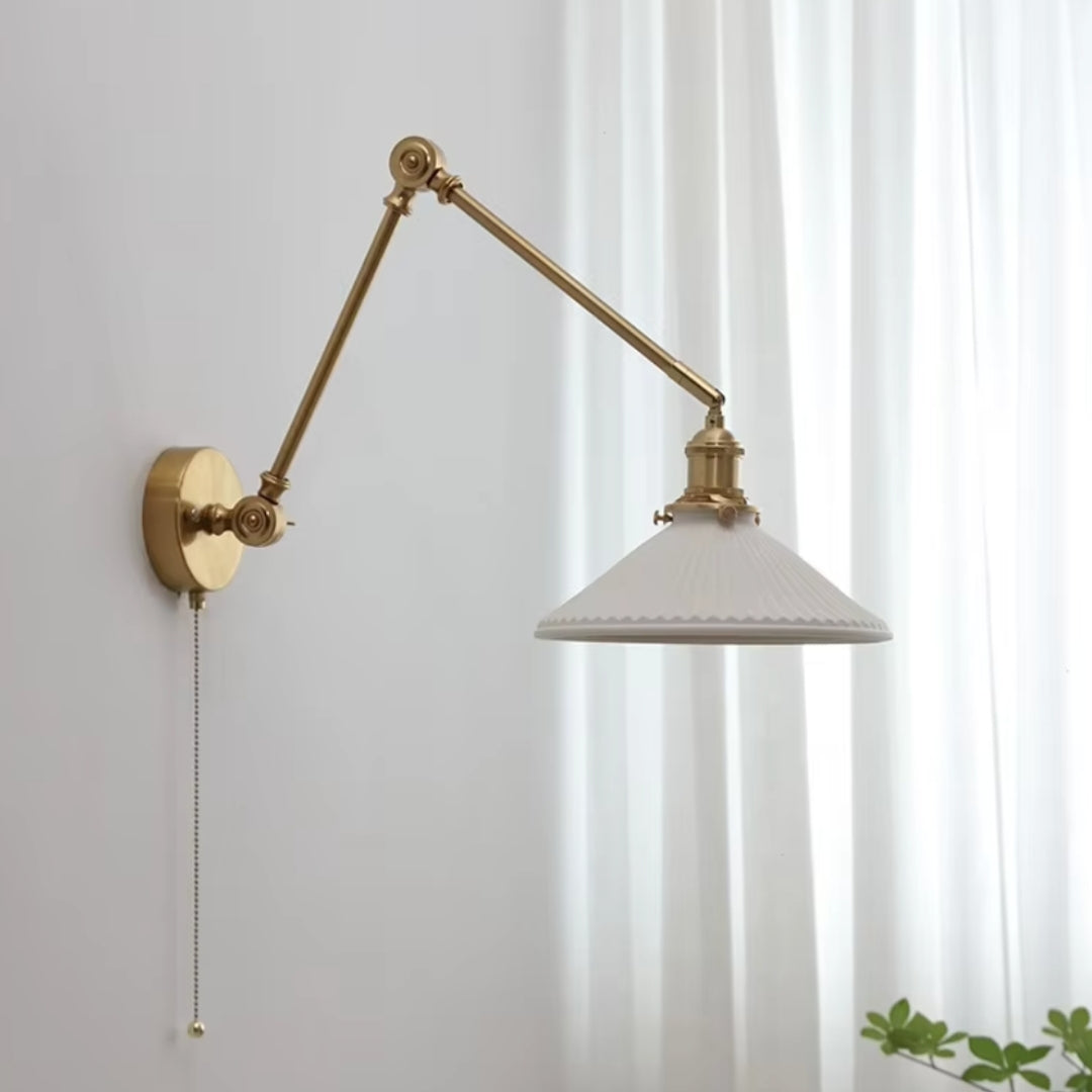 adjustable gold swing arm wall sconce for flexible living room lighting and task use