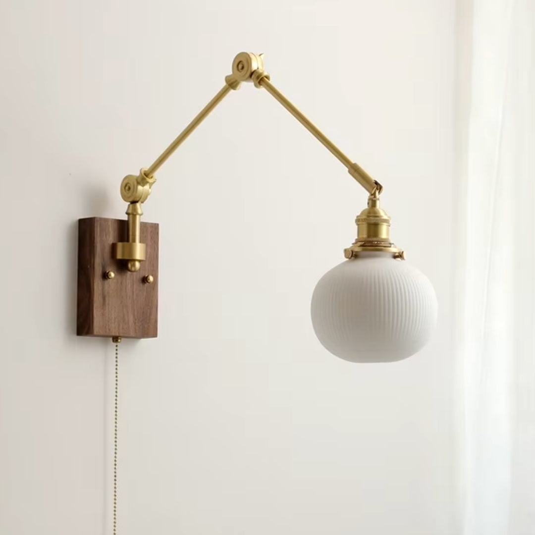 gold swing arm wall sconce for bathroom vanity lighting or stylish mirror lighting