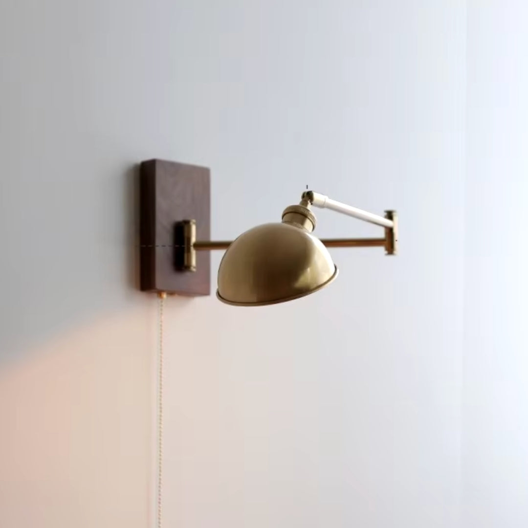 Adjustable swing arm of the wall sconce, demonstrating easy repositioning for task lighting or accent illumination